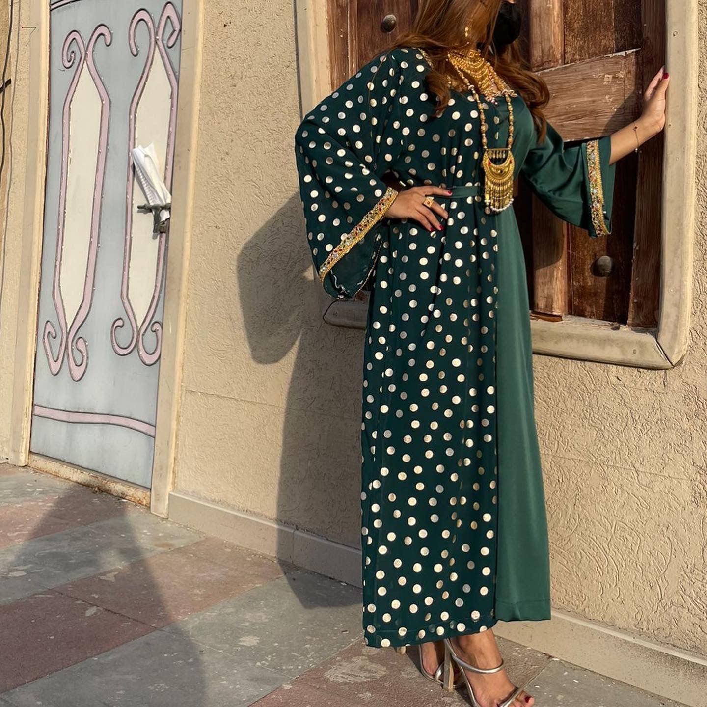 Green dress with white pokadots