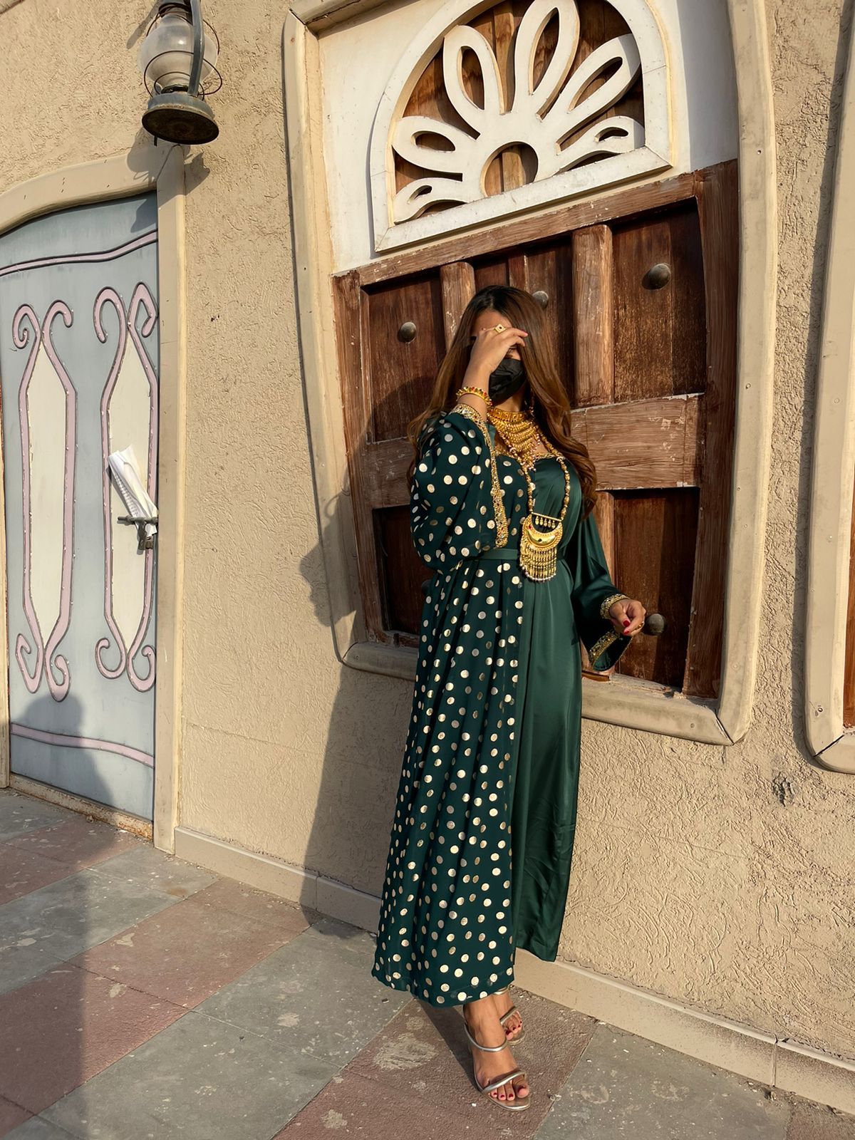 Green dress with white  pokadots