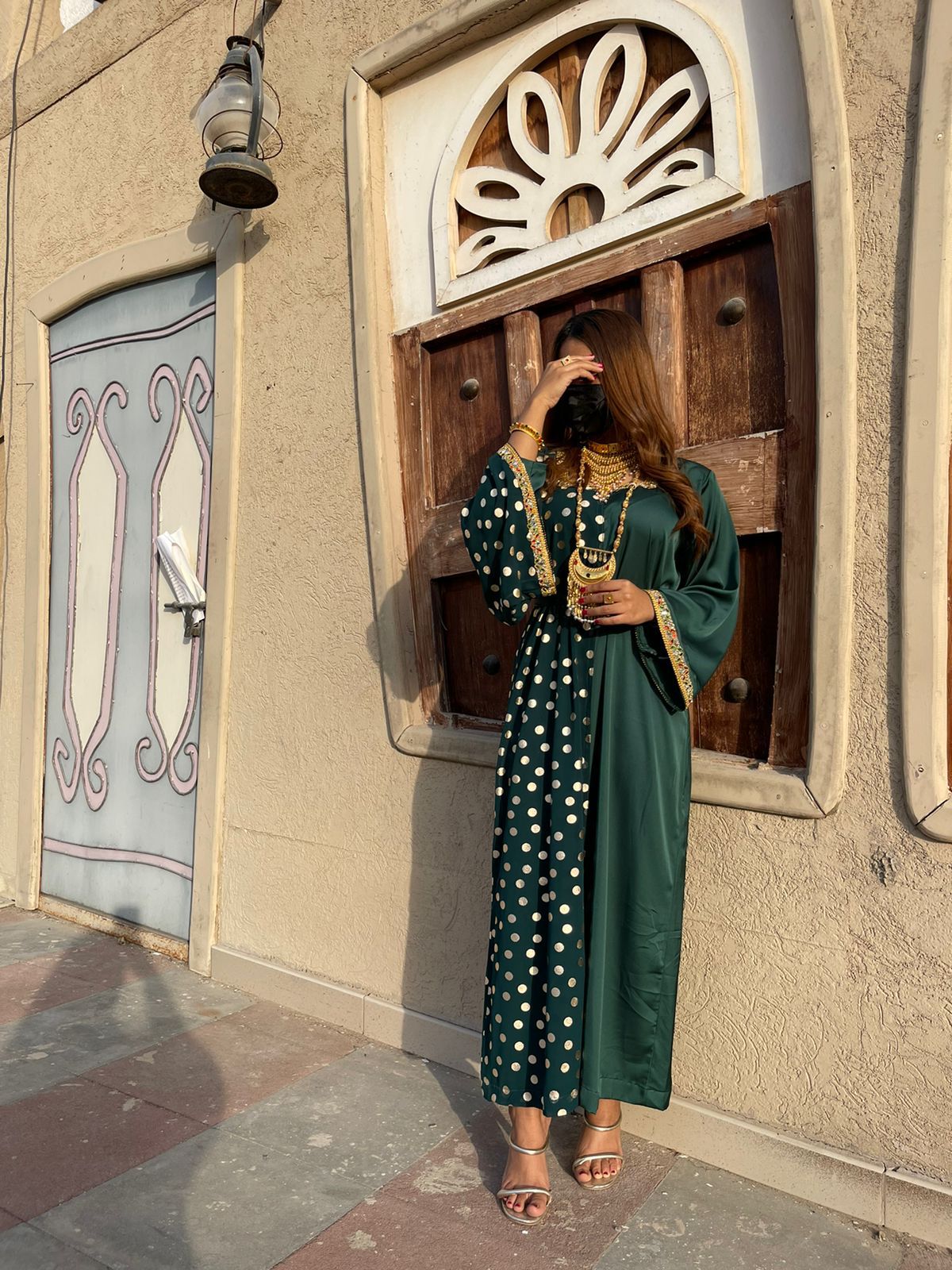 Green dress with white  pokadots